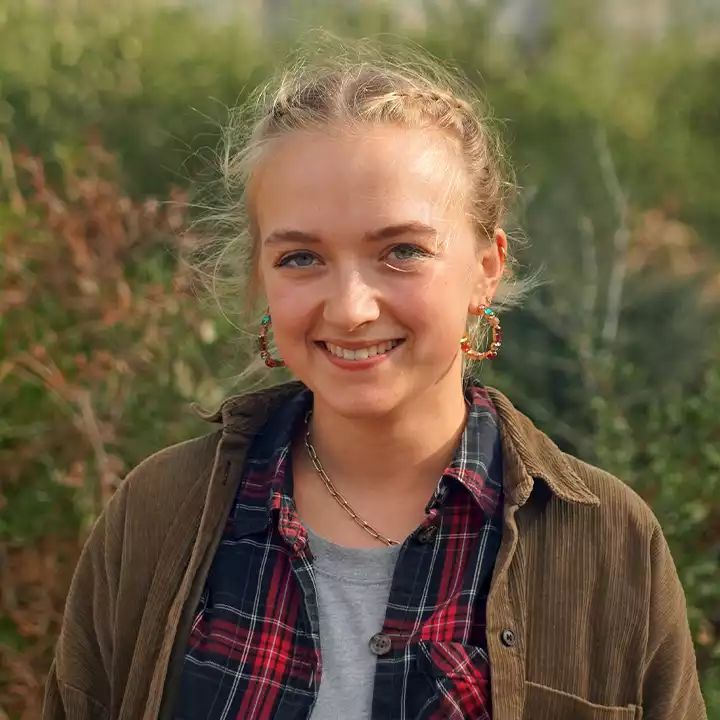 Portrait of Luna, Teaching Assistant at Alma Forest School.